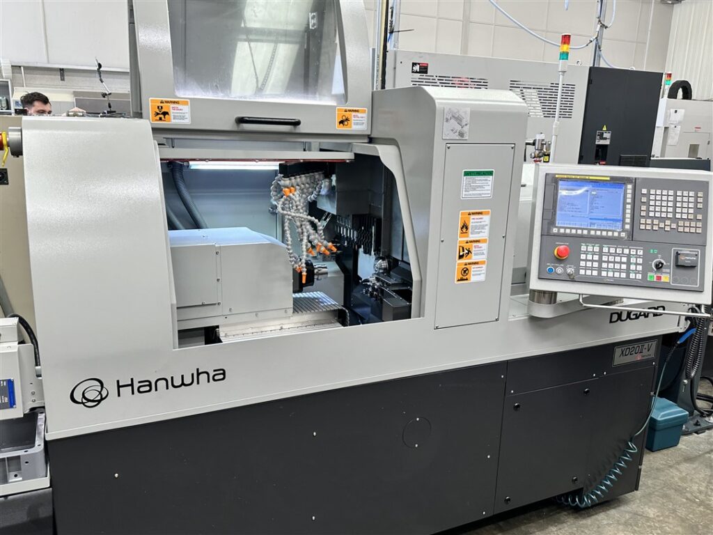 Hanwha XD20II CNC sliding head lathe at Adnet