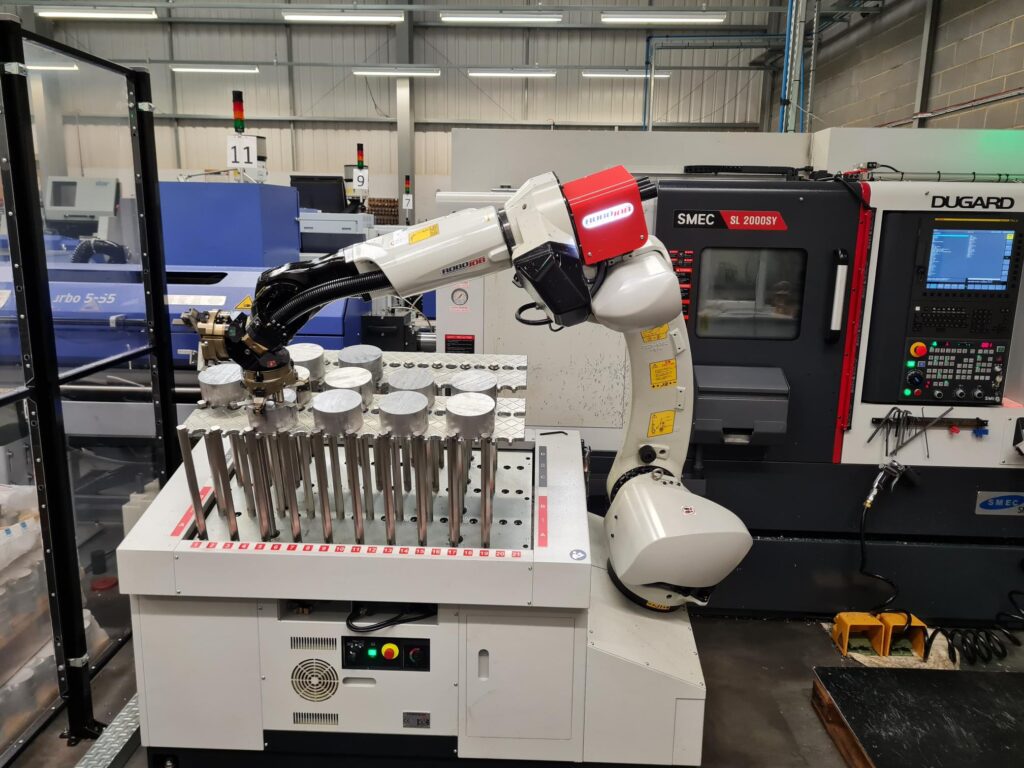 The Robot Picking a New Billet for Machining at Empire